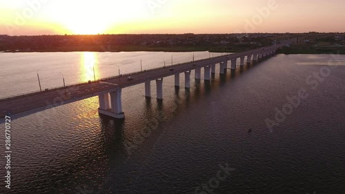 Wallpaper Mural Aerial shot of a lengthy bridge covering the Dnipro at splendid sunset in summer  Torontodigital.ca
