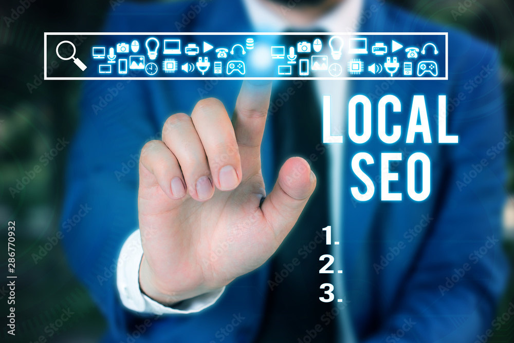 Word writing text Local Seo. Business photo showcasing helps businesses promote products and services to local customers Male human wear formal work suit presenting presentation using smart device Word writing text Local Seo. Business photo showcasing helps businesses promote products and services to local customers Male human wear formal work suit presenting presentation using smart device