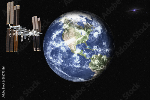 Fototapeta Naklejka Na Ścianę i Meble -  Planetary station satelite near Planet Earth  in outer space. Planetary concept. Science fiction. Elements of this image were furnished by NASA.