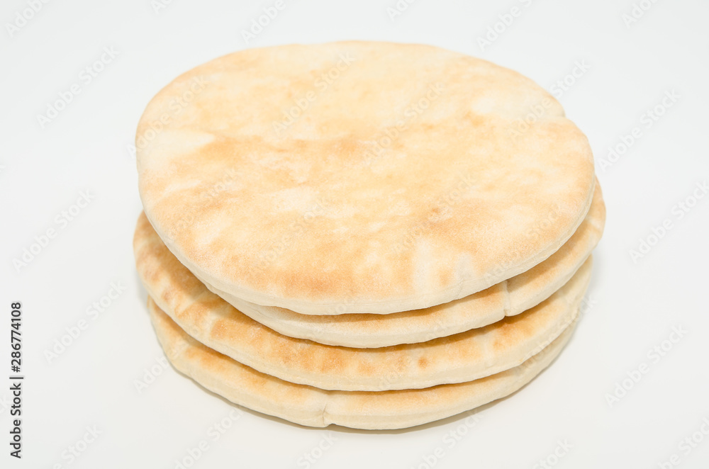 Pita flat bread isolated on white background Pita flat bread isolated on white background