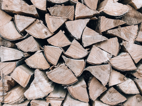 Firewood background. Woodpile of firewood