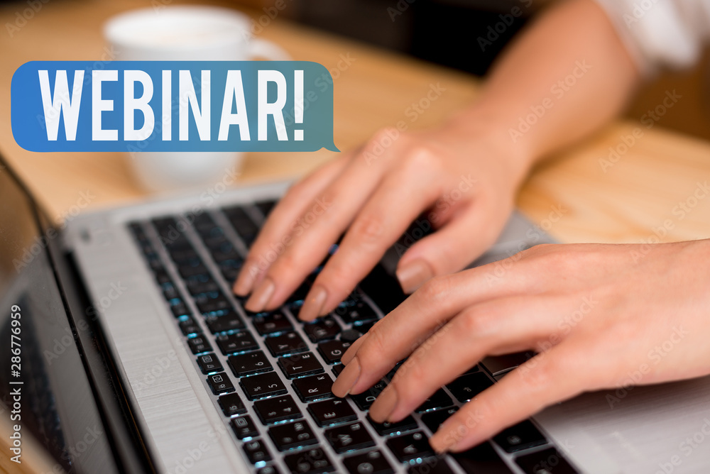 Handwriting text Webinar. Conceptual photo seminar or other presentation types that takes place on Internet woman laptop computer smartphone mug office supplies technological devices Handwriting text Webinar. Conceptual photo seminar or other presentation types that takes place on Internet woman laptop computer smartphone mug office supplies technological devices
