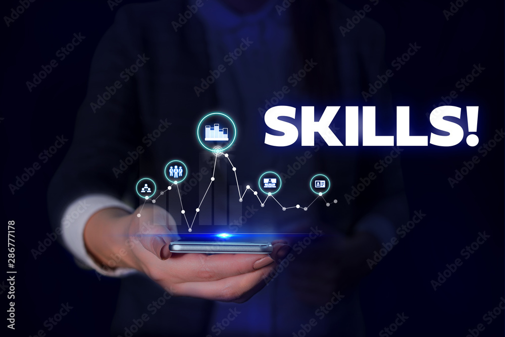 Handwriting text Skills. Conceptual photo ability do something very well by nature Woman wear formal work suit presenting presentation using smart device