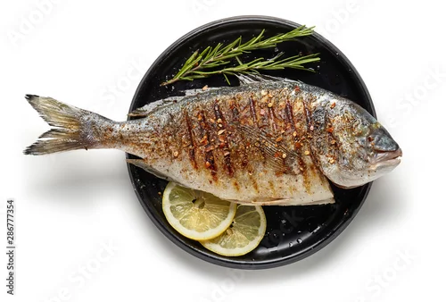 Panel kuchenny z motywem Grilled fish on black plate