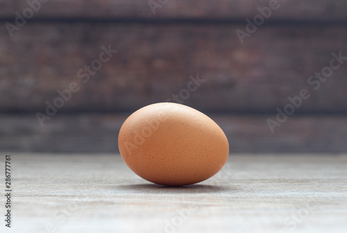 Close up of egg on a wooden background