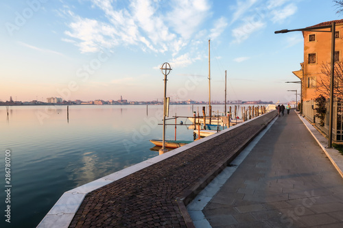 view of chiggia and sottomarina in venice at sunset photo