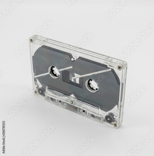 Clear plastic casette tape isolated on white background.