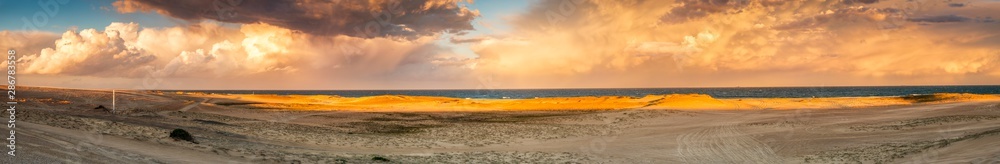 Storm and sunset, Stockton Sand Dunes, NSW, Australia
