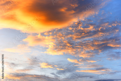 Dramatic sky sunset or sunrise colorful red and orange sky over cloud beautiful multicolor fiery background