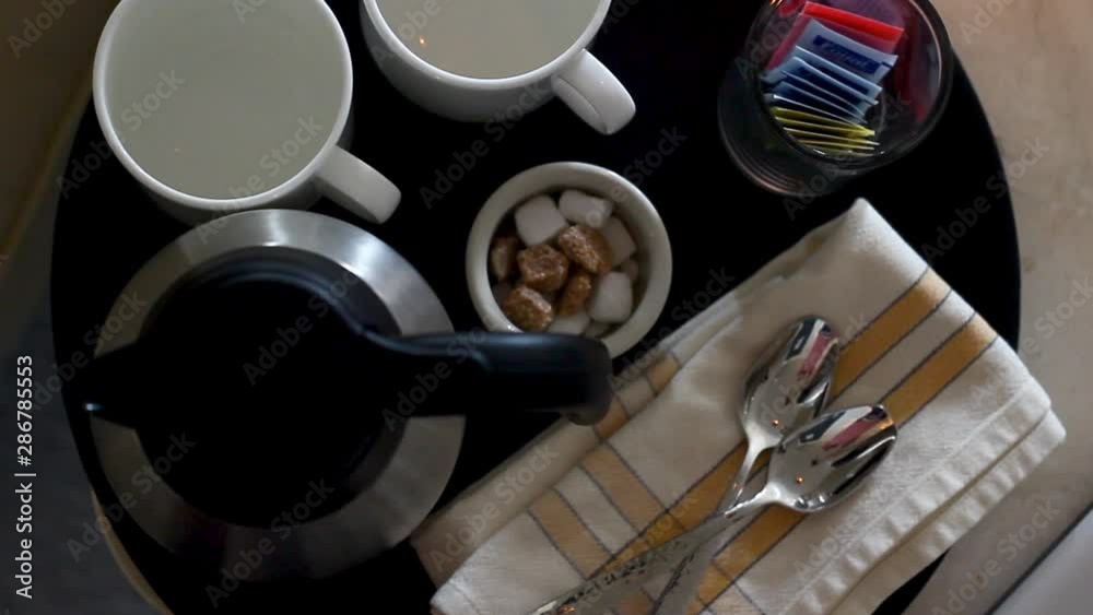 coffee and sugar and mugs on a table coffee and sugar and mugs on a table