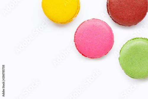 Colorful macarons isolated on white