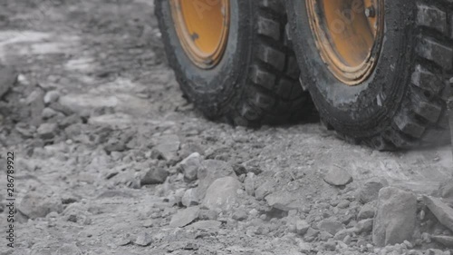 Closeup grader lines the road. Open pit coal mining