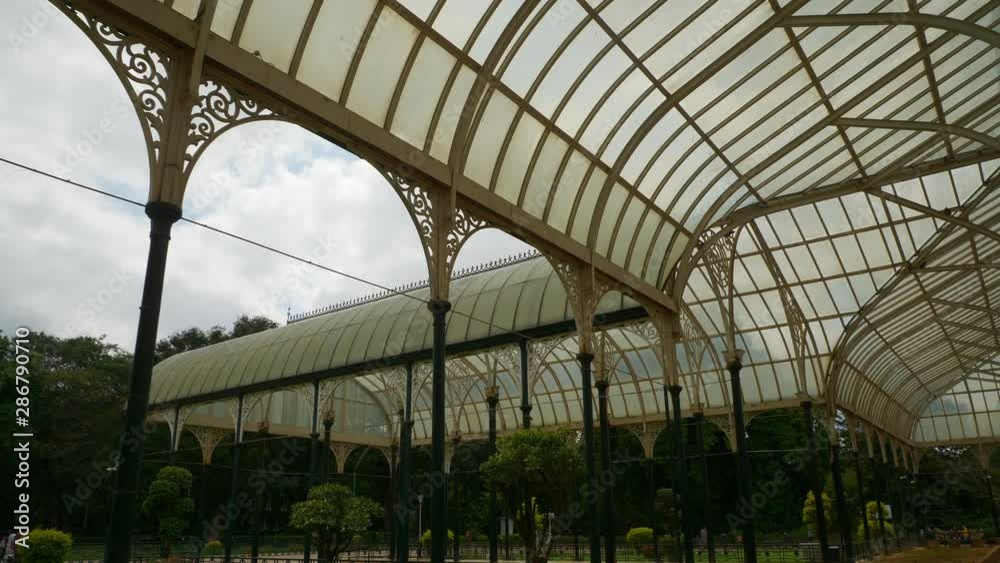 day time bangalore city botanical garden crystal palace hall slow motion panorama 4k india day time bangalore city botanical garden crystal palace hall slow motion panorama 4k india