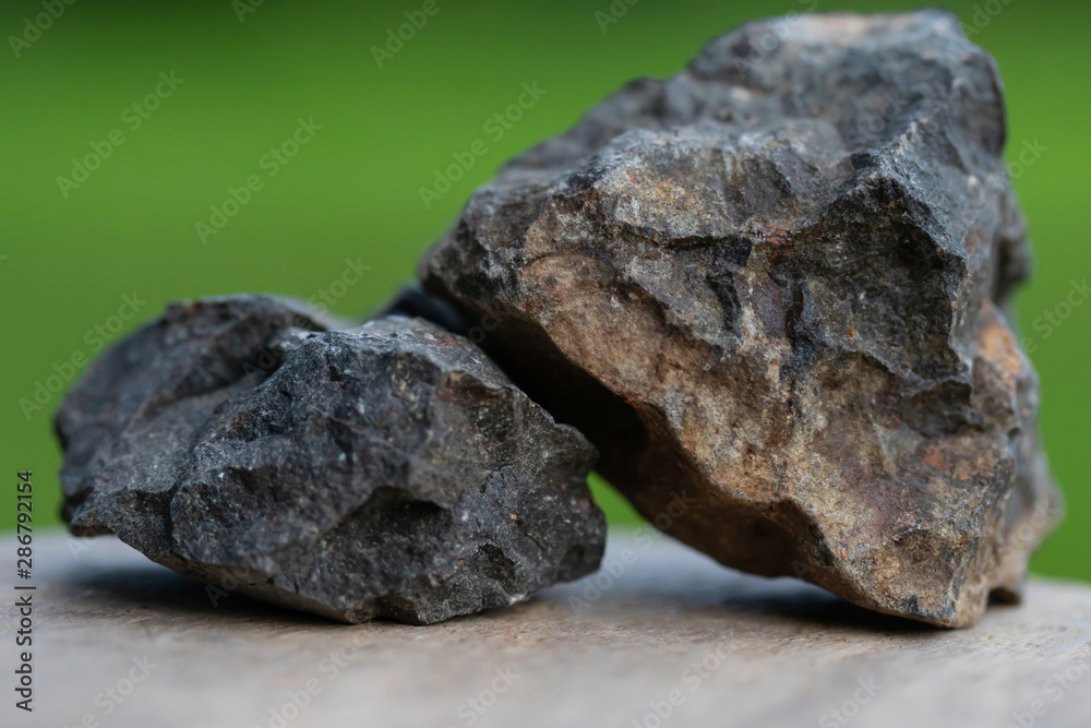 Basalt rock for industry isolate on green background