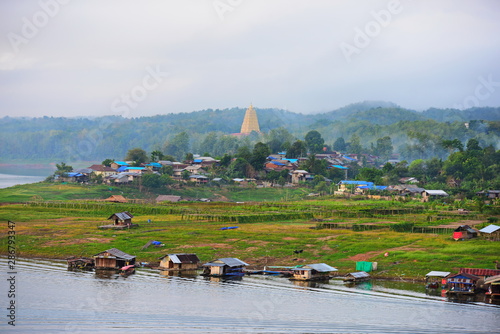 View of the River Bridge community near the wooden bridge in Sangkhla Buri district photo