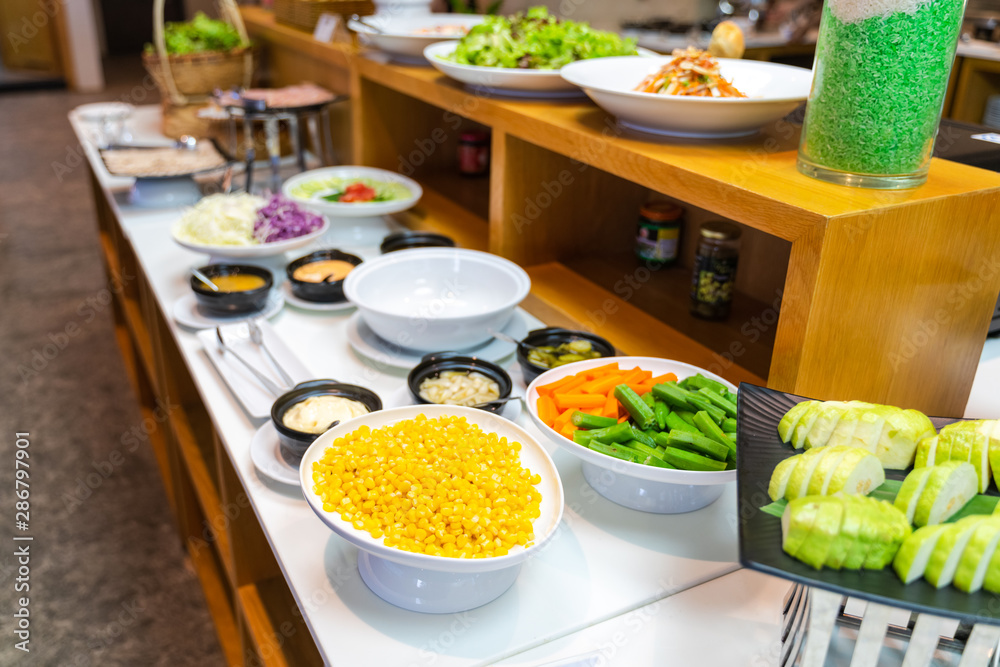 Fried corn with butter and seasonings in buffet Fried corn with butter and seasonings in buffet
