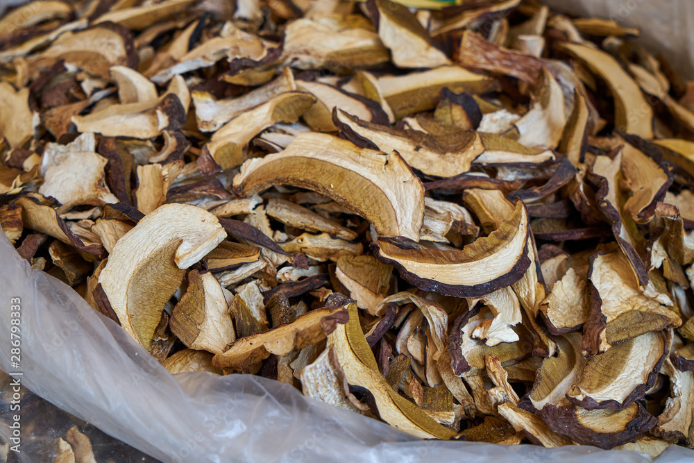 Image of dried porcini mushrooms. Traditional Russian food. Image of dried porcini mushrooms. Traditional Russian food.