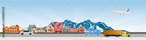 Flat vector illustration of  countryside  landscape street with cars, houses , family houses in small town and mountain with trees in background. Banner horizontal panorama.