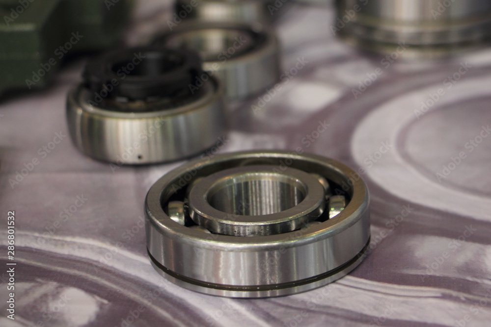 New ball bearing close-up with metal separator, vehicle transmission parts New ball bearing close-up with metal separator, vehicle transmission parts