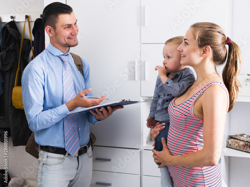 Manager of research compans talking with female photo