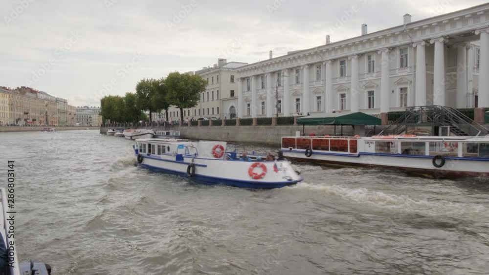 ST. PETERSBURG, RUSSIA - AUGUST 4, 2019: Department of Technology. State Educational Institution, view from the Fontanka river ST. PETERSBURG, RUSSIA - AUGUST 4, 2019: Department of Technology. State Educational Institution, view from the Fontanka river