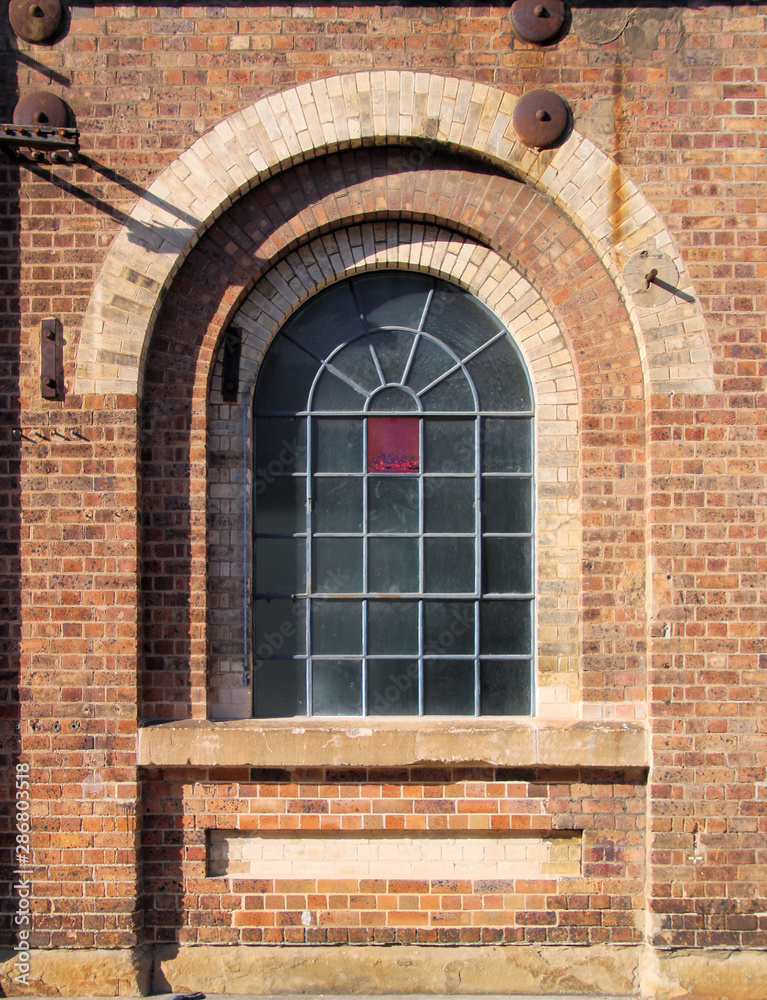Old Disused Factory Arch Window Old Disused Factory Arch Window
