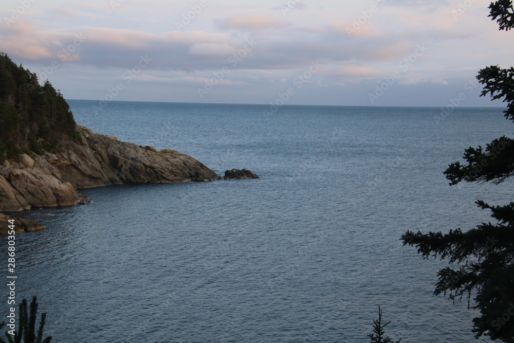 A rocky point protruding into the Atlantic ocean A rocky point protruding into the Atlantic ocean
