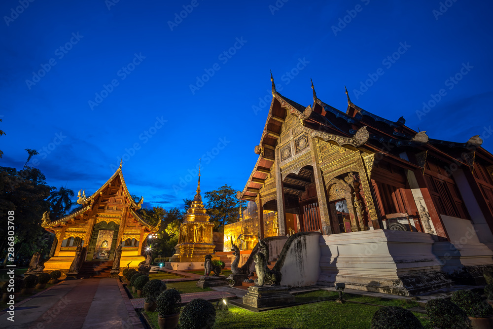 Famous Temple in Blue sky twilight time. Beautiful traditional architecture at Temple of Chiangmai Thailand, Asia..