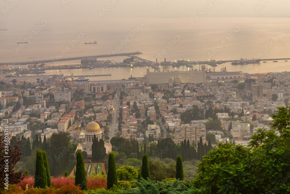 Fototapeta premium Sunrise view of downtown Haifa, the port, and the bay