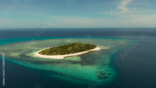 Tropical island with sandy beach with atoll and coral reef, aerial drone. Island on turquoise atoll. Summer and travel vacation concept, Camiguin, Philippines, Mindanao