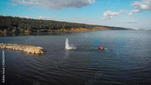 Innovative watersport practice on beautiful lake photo