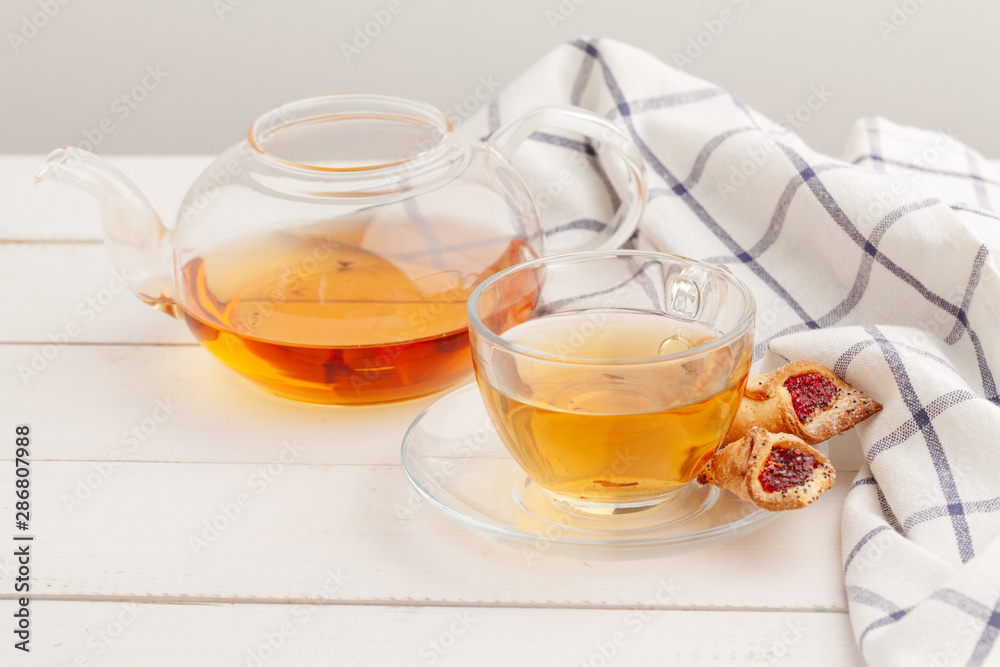 Homemade crunchy cookies and  tea on a wooden table