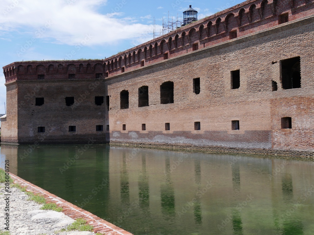 Moat at the left side of Fort Jefferson facing the entrance direction at the Dry Tortugas National Park, Florida.