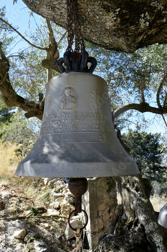 bells on an olive tree from a Greek Orthodox monastery in Zakynthos island