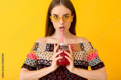 Young woman drinking health...