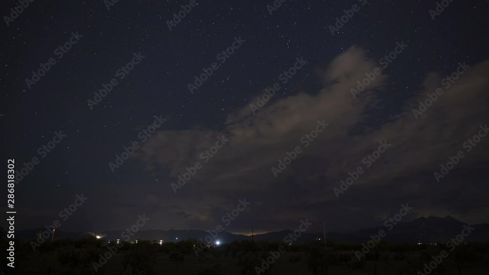 Time lapse of storms, lightning, and stars Time lapse of storms, lightning, and stars