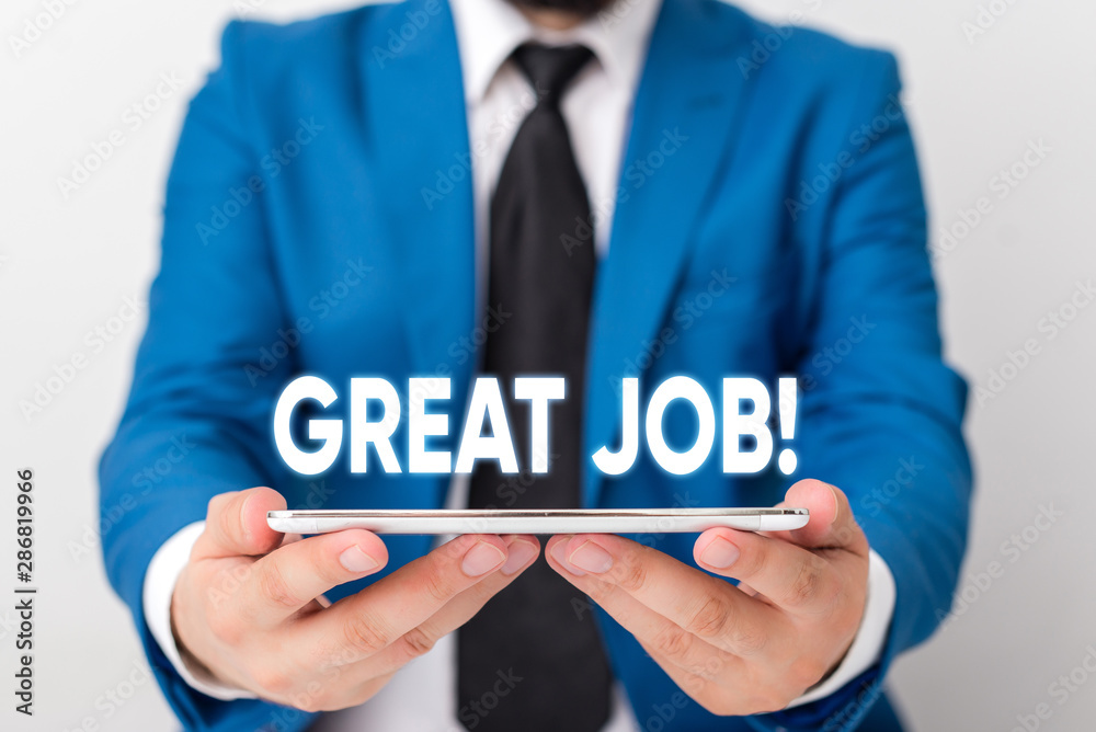 Handwriting text writing Great Job. Conceptual photo used praising someone for something they have done well Businessman in blue suite with a tie holds lap top in hands Handwriting text writing Great Job. Conceptual photo used praising someone for something they have done well Businessman in blue suite with a tie holds lap top in hands