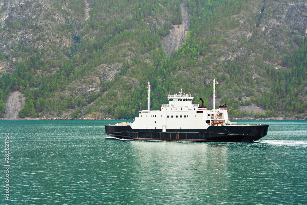 Ferry ship sailing in Norwegian fjords, Norway Ferry ship sailing in Norwegian fjords, Norway