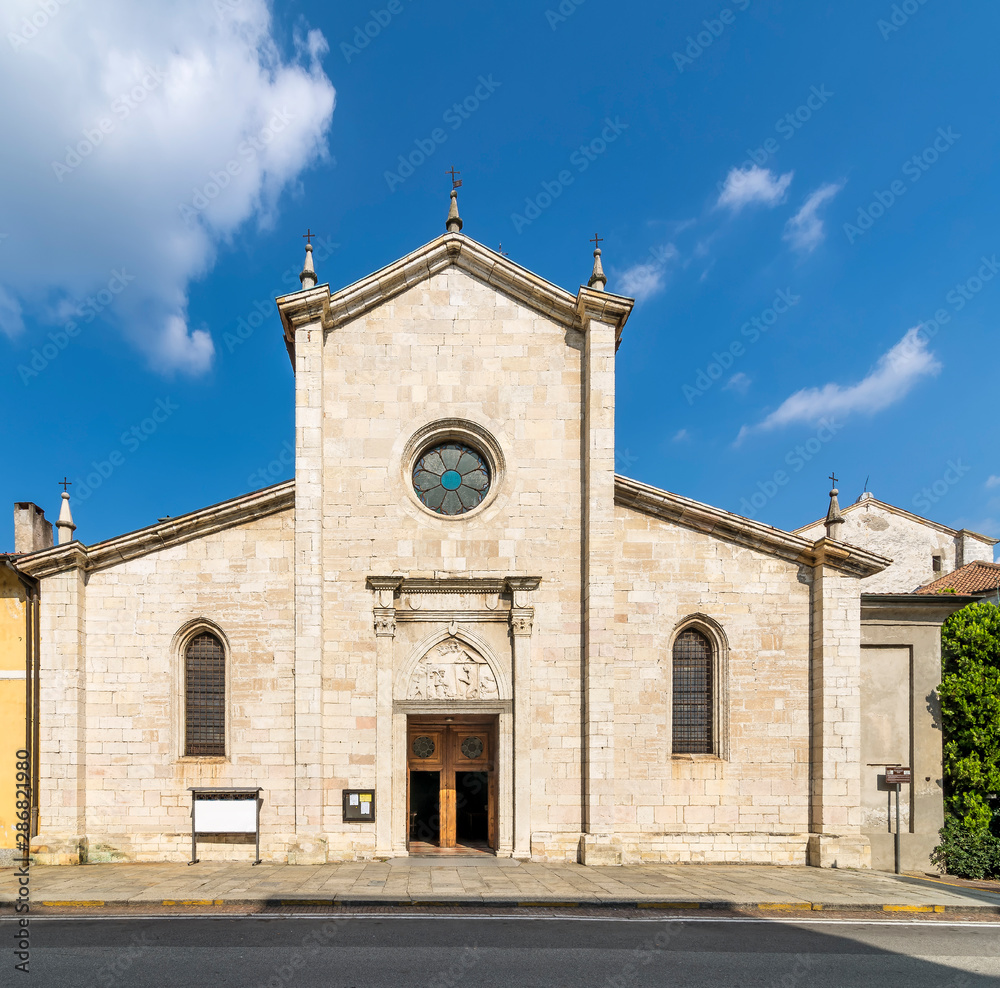 The facade of the beautiful Collegiate Church of Santa Maria Nascente in Arona, Italy, on a sunny day