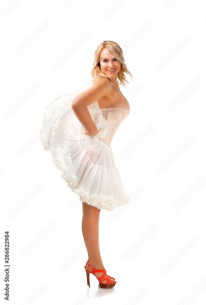 Naklejka premium Beautiful sexy model, erotick studio shoot. At white background.