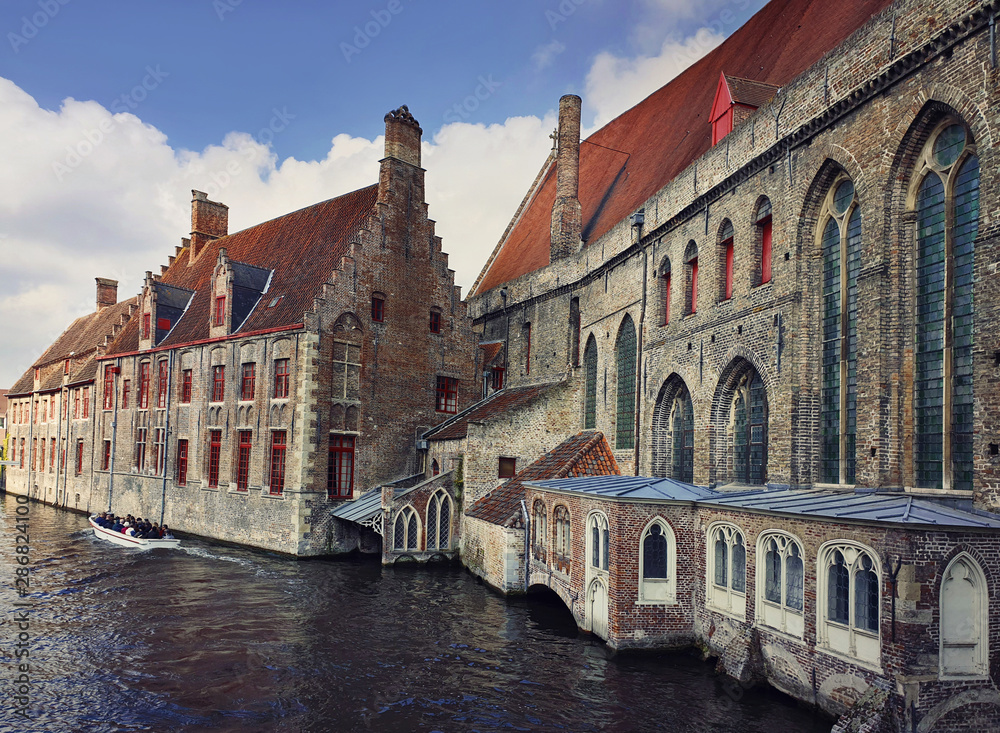 Architecture outdoors of Sint-Jans hospital, the old city buildings on the water canals in Bruges, Belgium.