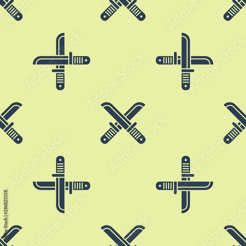 Blue Crossed hunter knife icon isolated seamless pattern on yellow background. Army knife. Vector Illustration