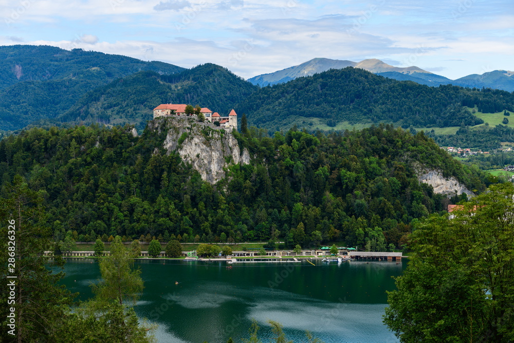 Landscape with lake Bled and a medieval castle.