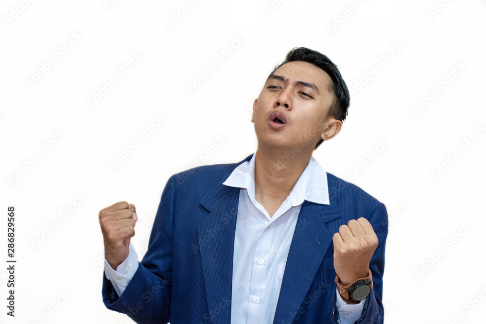 Portrait of successful asian businessman expressing succes Portrait of successful asian businessman expressing succes