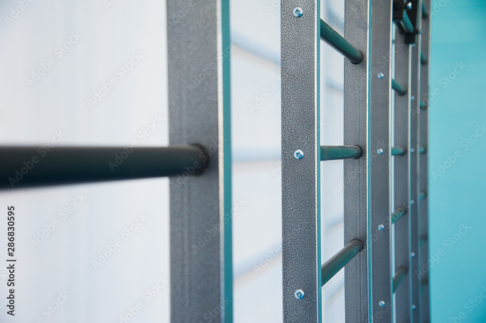 Wall bars in the gym. Wall bars in the school gymnastic hall Wall bars in the gym. Wall bars in the school gymnastic hall