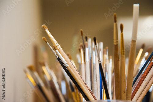Brushes for painting. Various shapes of bristle. Art workshop