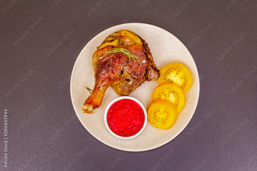 Crusty roasted duck leg. Traditional French food confit preparation Crusty roasted duck leg. Traditional French food confit preparation
