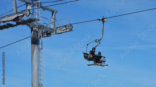 Chairlifts in the sky. Winter snow