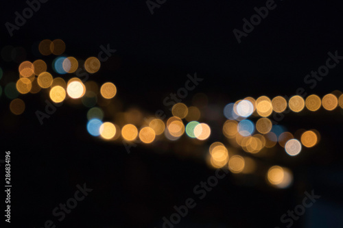 Defocused lights of a mountain village © pacodocus