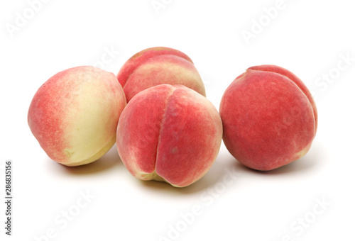 ripe peach on white background 